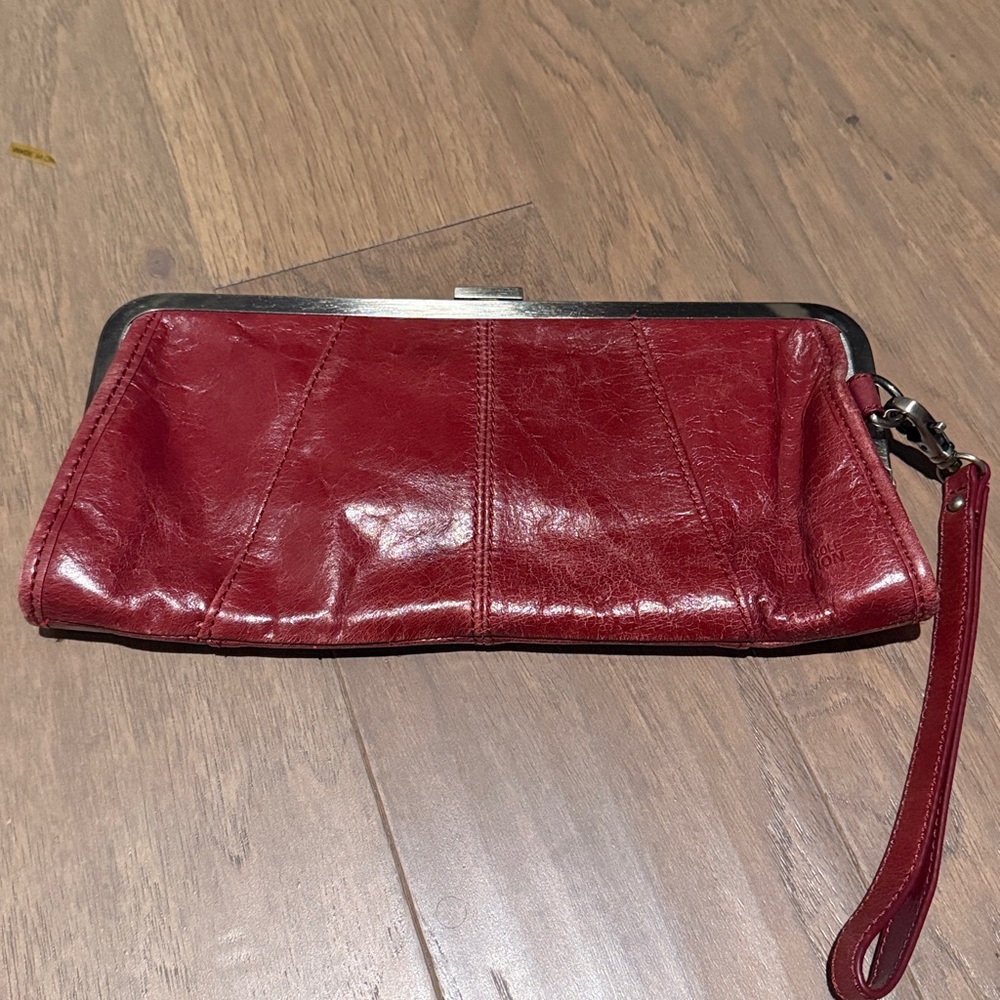 Red Kenneth Cole Reaction clutch